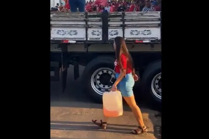 Candidata a vereadora de São Miguel do Fidalgo é flagrada em atitude suspeita com galão de gasolina durante evento de campanha